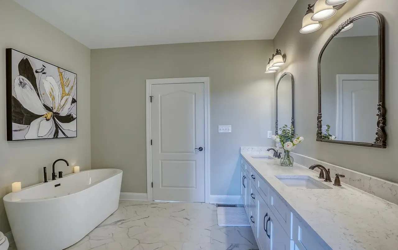 Primary bathroom with freestanding soaking tub and double vanity